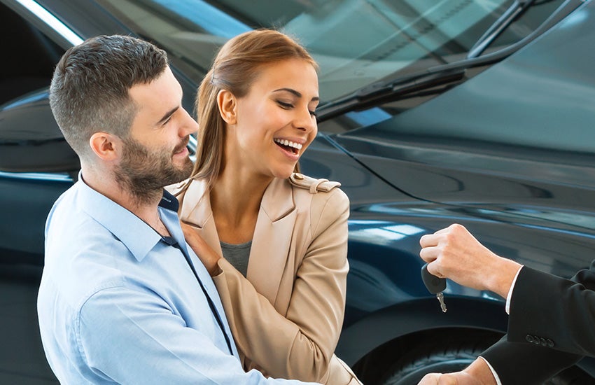 Family working with sales person